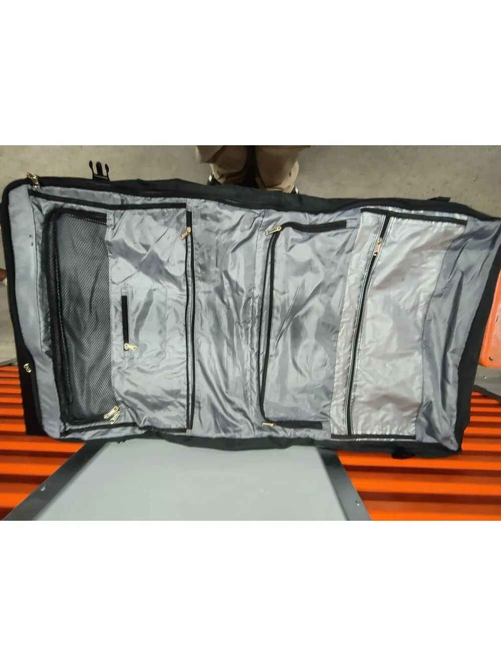 Delsey Black Garment Bag with Multiple Zippered Compartments